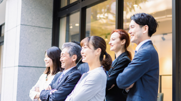 Bright modern living room and kitchen with large windows, hardwood floors, and a 3D virtual tour floor plan overlay.